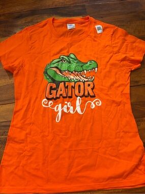 Port and Company Orange "Gator Girl" Graphic Tee with Green Gator
